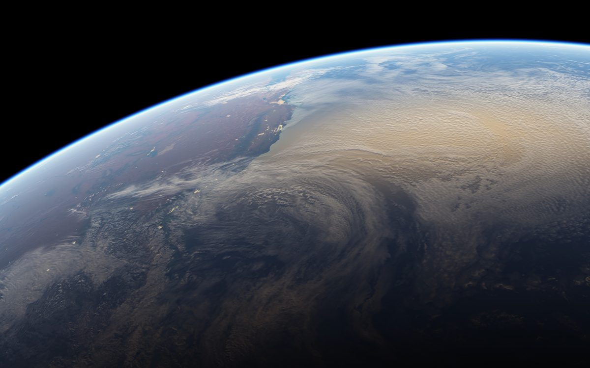 宇宙から見た地球と薄く青い大気の層